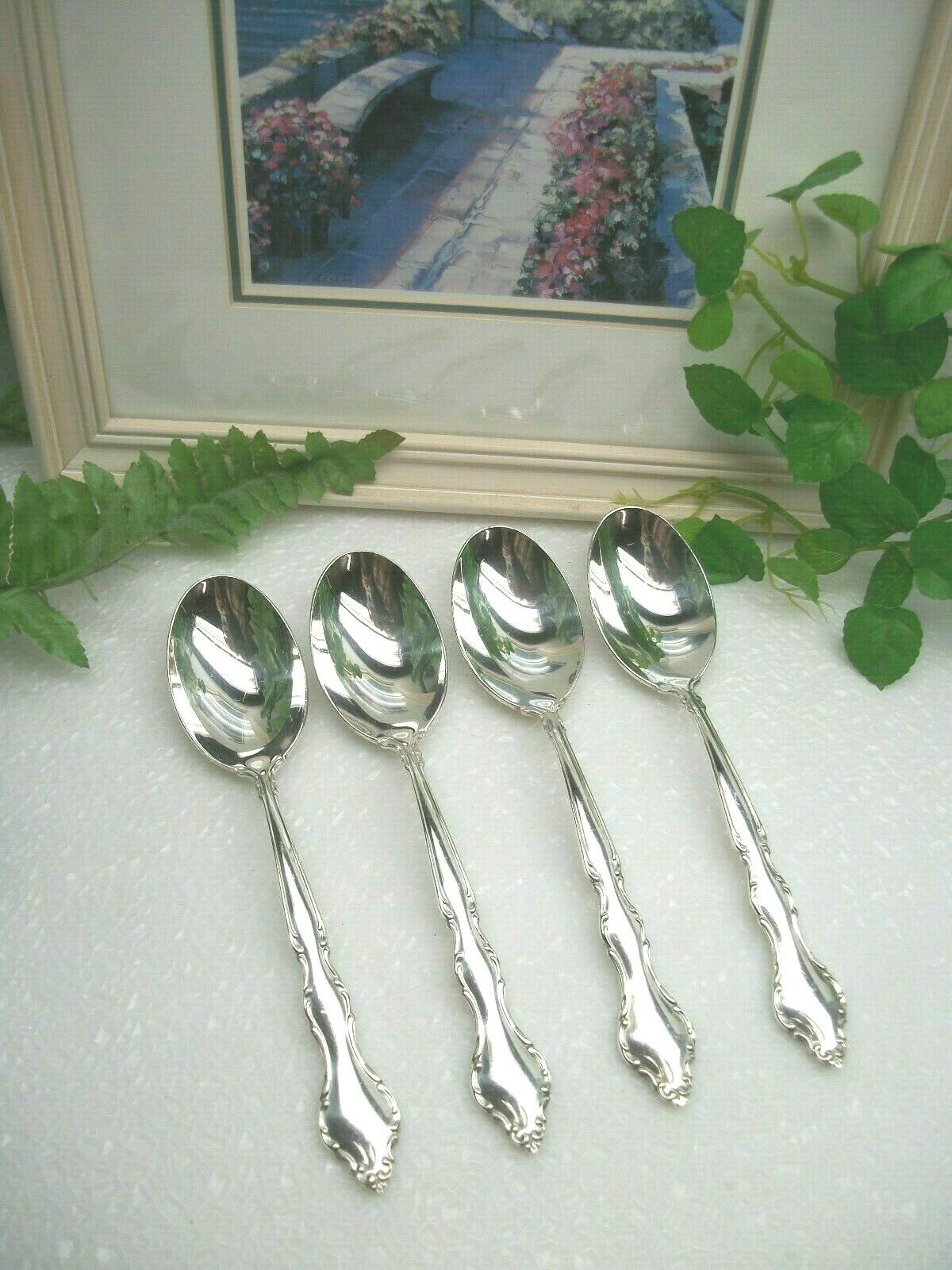 4  International Deep Silver  Wakefield  Silverplate Oval Place Soup Spoons 1965
